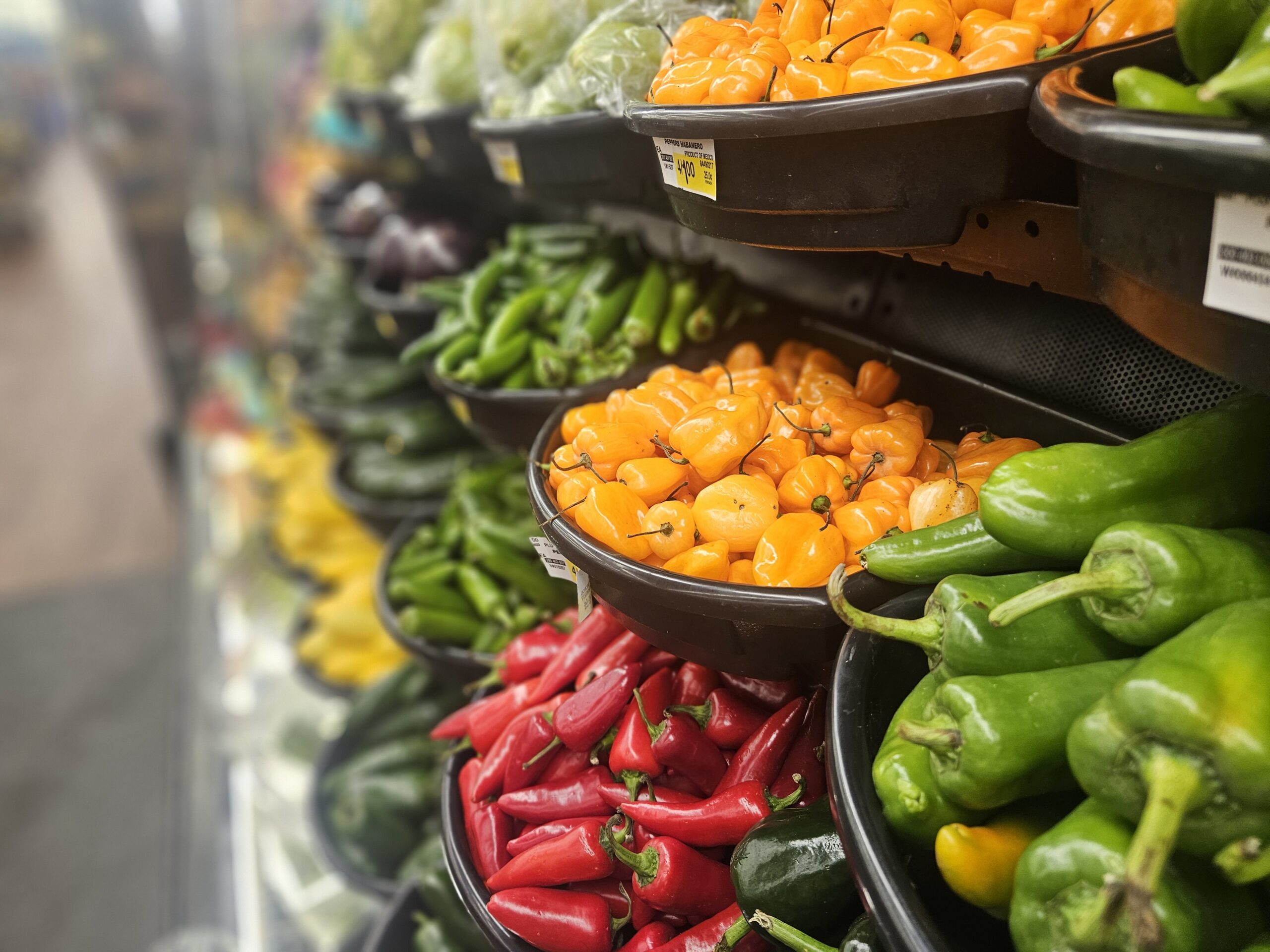 colorful peppers in grocery store